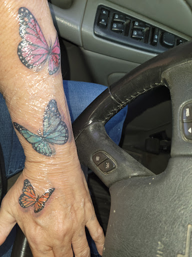 Explore bird cage tattoo ideas, creative tattoo ideas in Mooresville, available at The Stabbernacle Tattoo and Piercing Studio