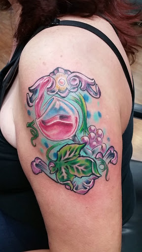 Explore wrist tattoo ideas for females, creative tattoo ideas in Sandwich, available at Family Pride Tattooing and Piercing