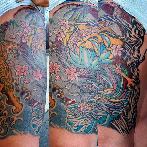 Explore back tattoos ideas guys, creative tattoo ideas in Indianapolis, available at Revved Up Tattoos