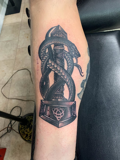 Find time tattoo ideas for your next unique tattoo in La Crosse at Blue Line Tattoo