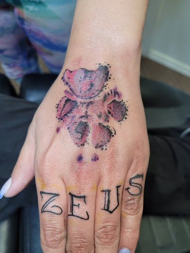 Explore overcome tattoo ideas, creative tattoo ideas in Angola, available at Hoodlum Ink