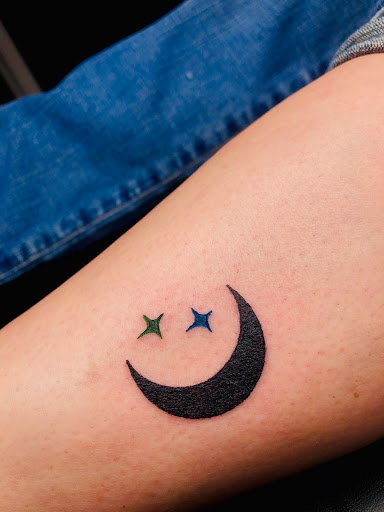 Explore throat tattoo ideas for males, creative tattoo ideas in North Tonawanda, available at Dark Side Ink Tattoo Studio