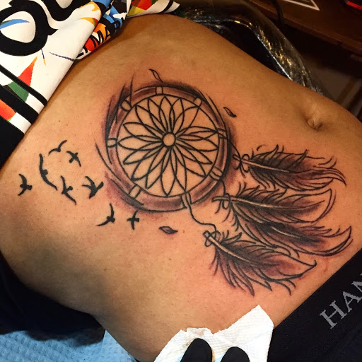 Explore mens calf tattoo ideas, creative tattoo ideas in Atlanta, available at Camp Creek Body Art & Laser