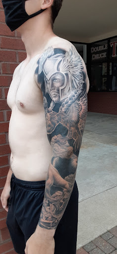 Explore axe tattoo ideas, creative tattoo ideas in Cary, available at Double Deuce Tattoo and Art Gallery