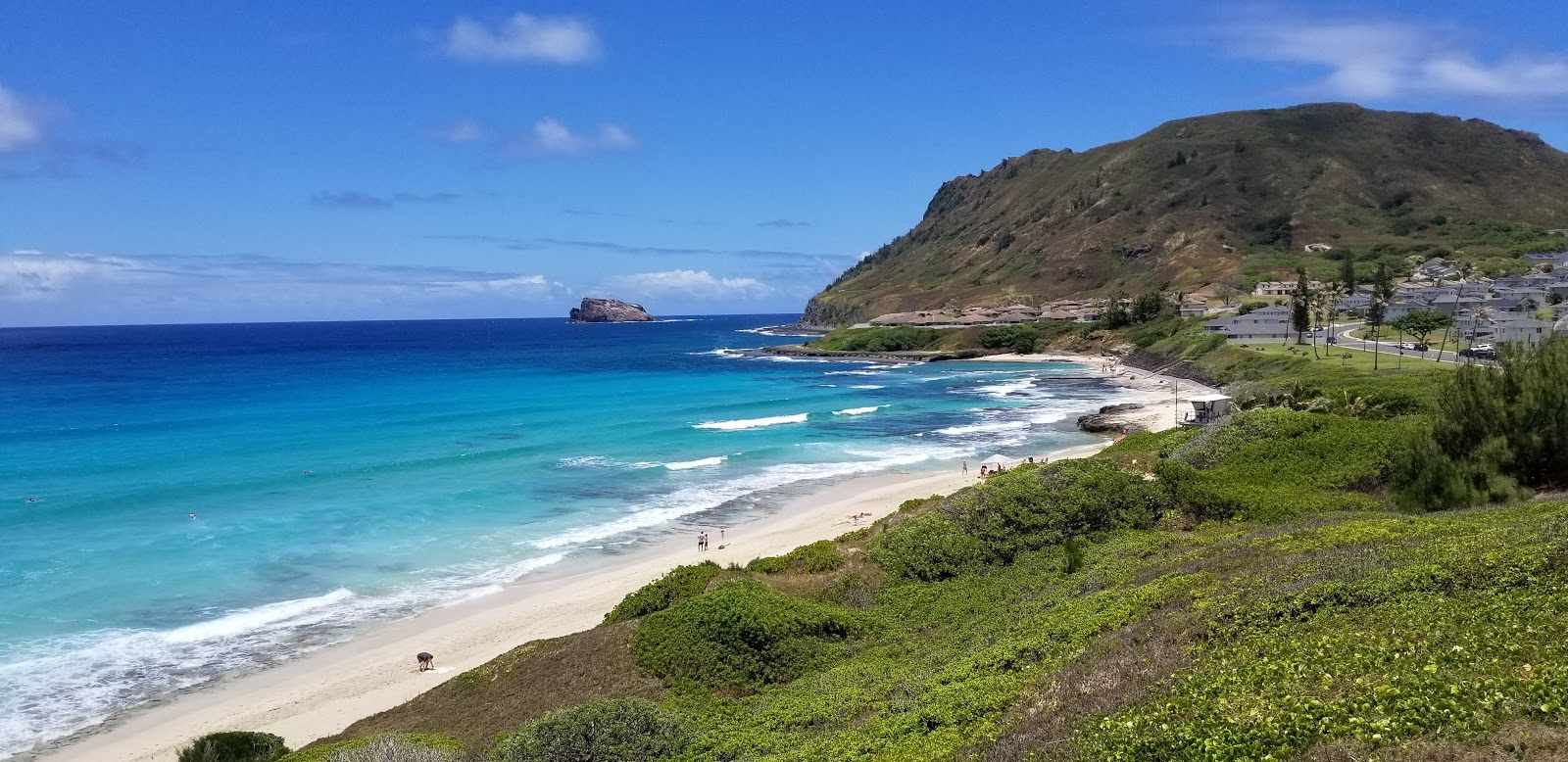 Foto af North Beach med lys sand overflade