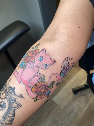 Explore skull and crossbones tattoo ideas, creative tattoo ideas in Davenport, available at Fine Ink Studios Tattoos
