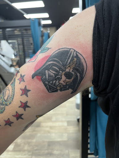 Explore half sleeve tattoo ideas black and grey, creative tattoo ideas in Buford, available at Wild Tribe Tattoos and Piercings