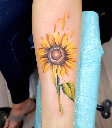 Explore mens tattoo sleeve ideas black and grey, creative tattoo ideas in Nashville, available at Titan Tattoo