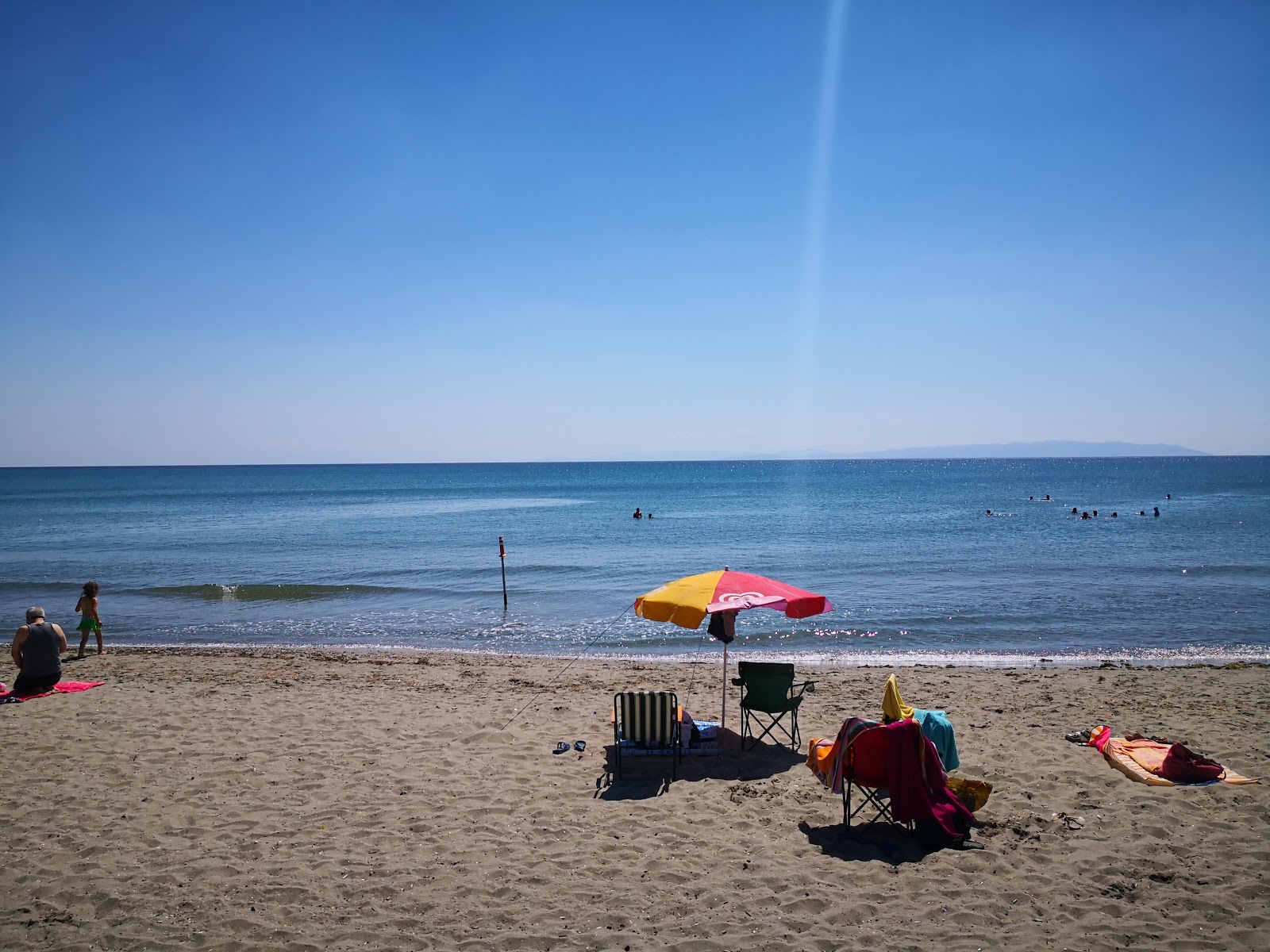 Foto di Degirmenalti beach con una superficie del sabbia marrone