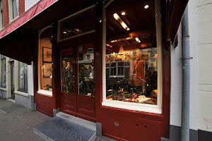 Conemans Tailor since 1906 P J M