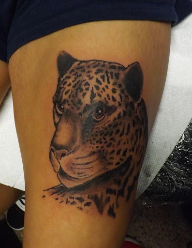 Explore spartan helmet tattoo ideas, creative tattoo ideas in Flint, available at Sylvertooth Tattoos & Piercings