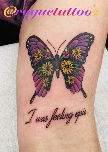 Explore globe tattoo ideas, creative tattoo ideas in Bristol, available at Rogue Tattoos