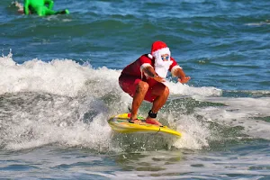 Surfing Santas image