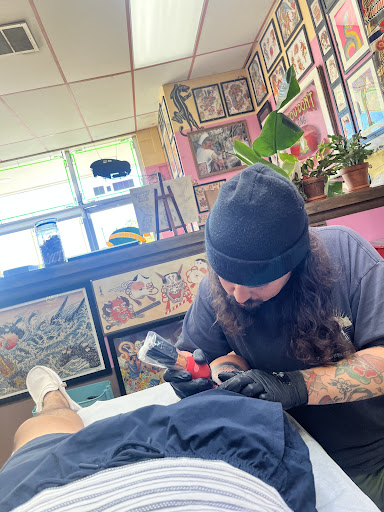 Explore honey bee tattoo ideas, creative tattoo ideas in Boulder, available at Strange Magic Tattoo