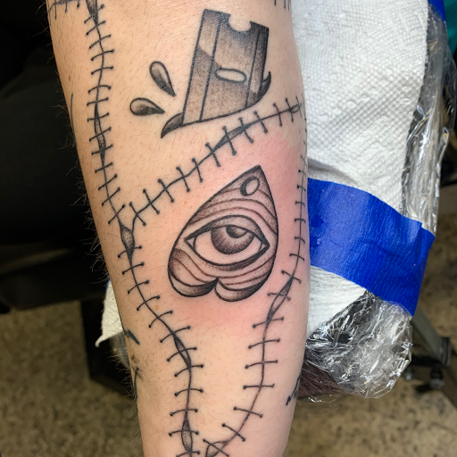 Explore venom tattoo ideas, creative tattoo ideas in Sanford, available at Luv Ink