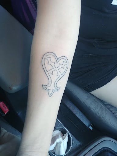 Explore arm tattoo ideas flowers, creative tattoo ideas in Glendale, available at Ace Tattoo and Piercing