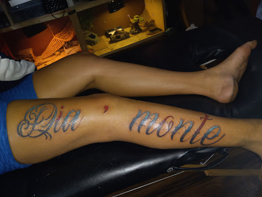 Explore batman logo tattoo ideas, creative tattoo ideas in Kewanee, available at Splat Ink tattoos and piercings