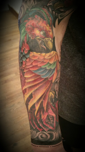 Explore griffin tattoo ideas, creative tattoo ideas in Boise, available at All You Can INK Tattoo Studio