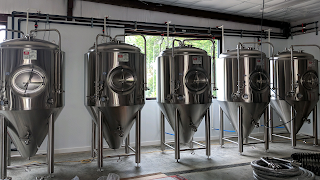 A row of beer taps