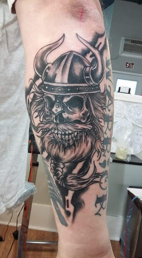 Find is a hand tattoo a bad idea for your next unique tattoo in Pennsboro at Juxd Tattoos