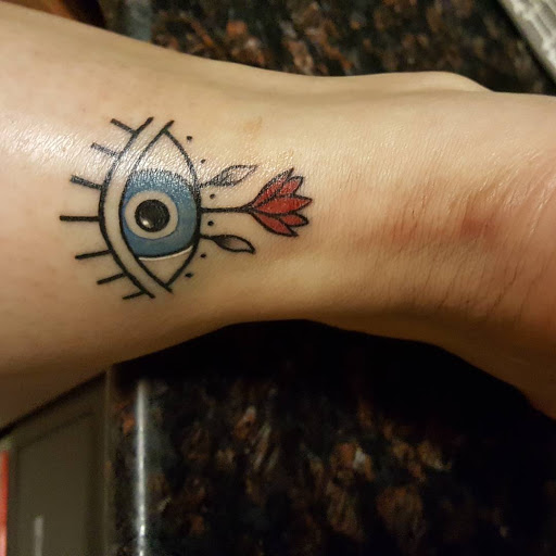 Explore cool dragon tattoo ideas, creative tattoo ideas in Arlington, available at Urbans Tattoo & Piercing Studio