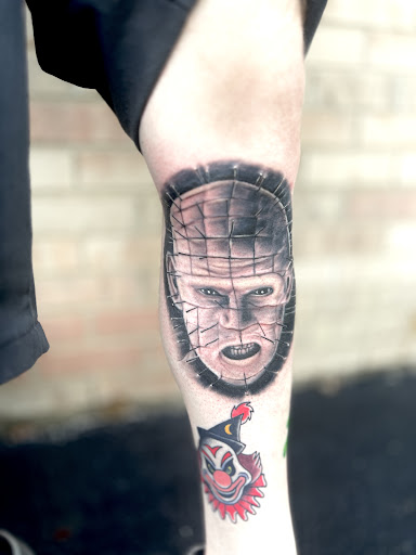 Explore leg tribal tattoo ideas, creative tattoo ideas in Lockport, available at Archer Ink Tattoo