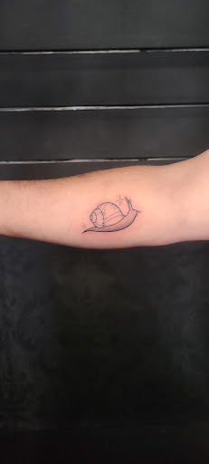 Explore mens neck tattoo ideas, creative tattoo ideas in Stevens Point, available at International Ink Tattoos