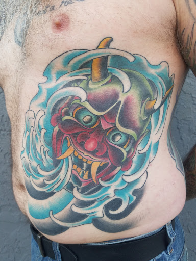 Explore umbrella tattoo ideas, creative tattoo ideas in Powell, available at Hummingbird Tattoo Studio