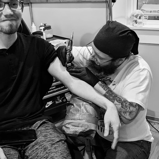 Tattoo Shop «The Shop», reviews and photos, 141 S Grand Ave, Fowlerville, MI 48836, USA