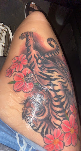 Explore tattoo ideas behind the ear tattoos, creative tattoo ideas in Tupelo, available at Primal Ink Tattoo Studio