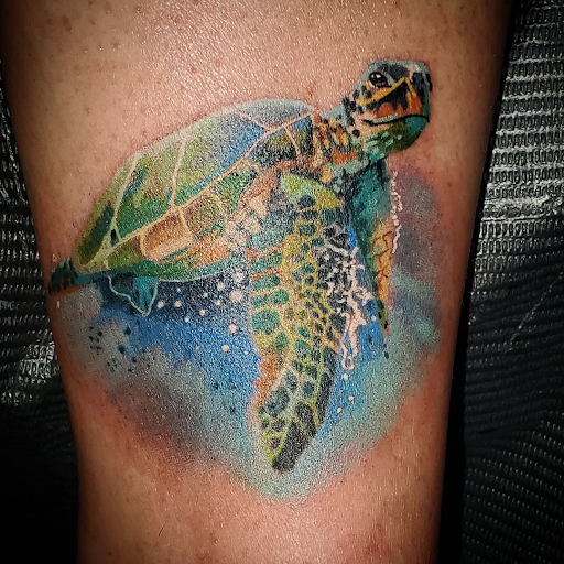 Explore little ghost tattoo ideas, creative tattoo ideas in Coral Springs, available at Salvation Tattoo Lounge Coral Springs