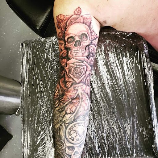Explore smoke tattoo ideas, creative tattoo ideas in Cedar, available at Emerald Monkey Tattoo