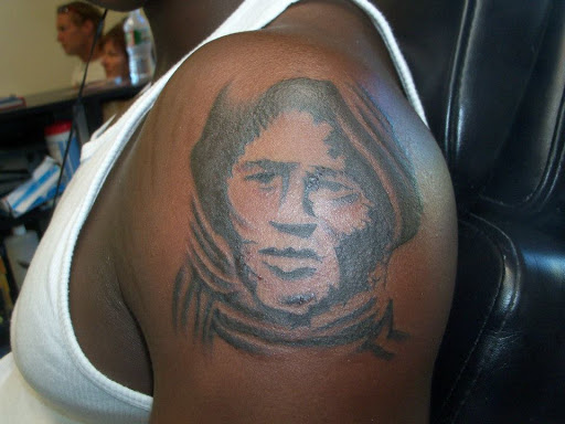 Explore tattoo ideas for black men, creative tattoo ideas in Pelham, available at Tattoo Fever