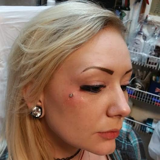 Explore tattoo ideas for sons, creative tattoo ideas in Elko, available at Custom Tattoos and Body Piercing Studio