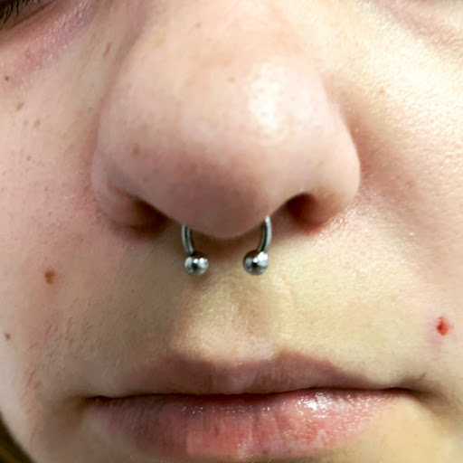 Explore thigh tattoos ideas for guys, creative tattoo ideas in Round Rock, available at Piercings by Toni