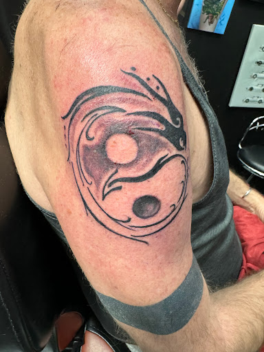 Find tattoo ideas for mother's for your next unique tattoo in Tulsa at Royal Ink Tattoos And Piercings