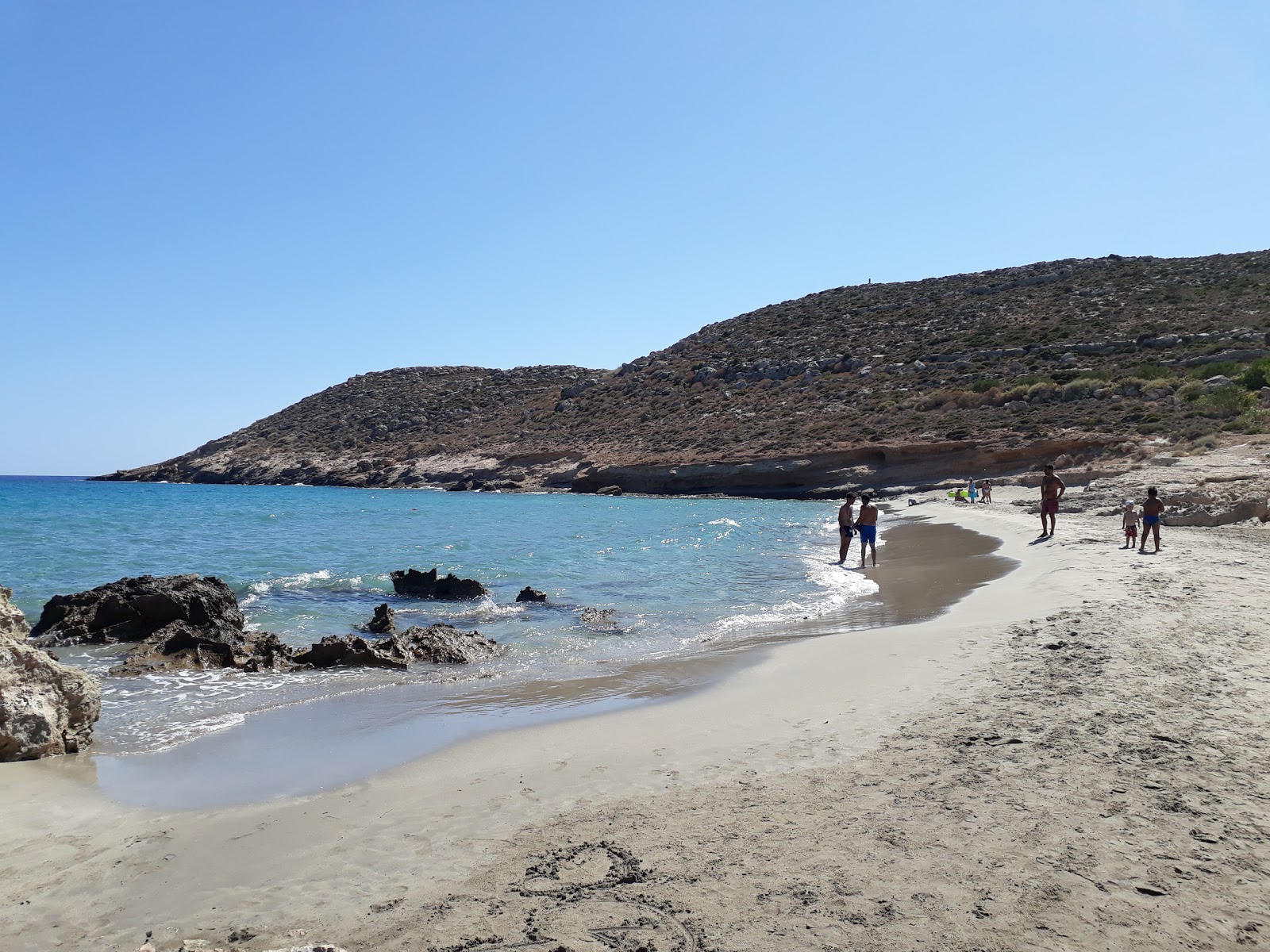 Photo de Argilos beach avec l'eau cristalline de surface