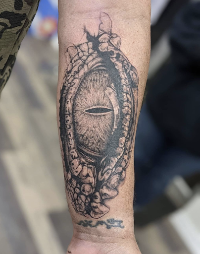 Explore terrifier tattoo ideas, creative tattoo ideas in Royston, available at Tasi Tattoo