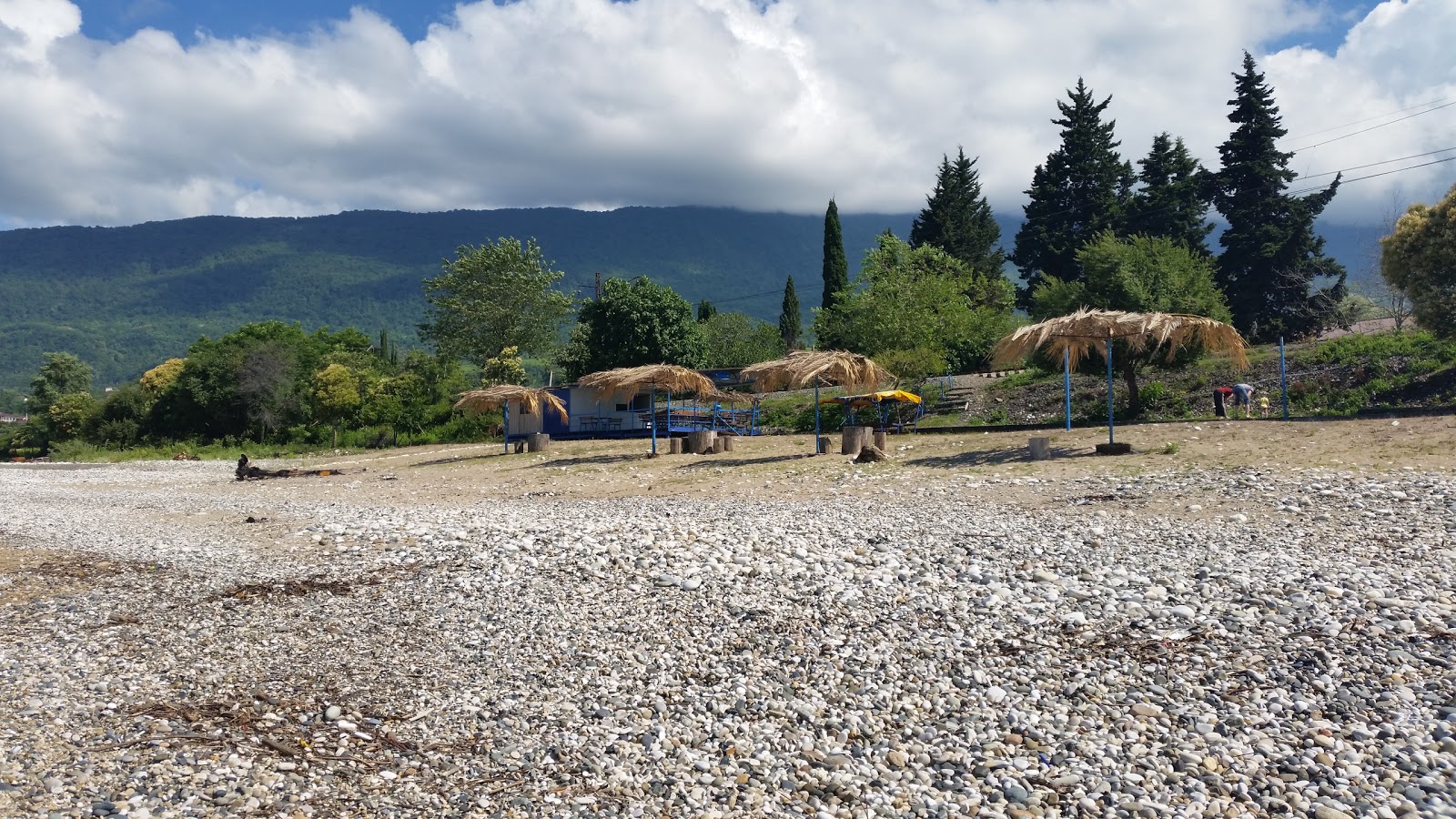 Amra beach'in fotoğrafı kirli temizlik seviyesi ile