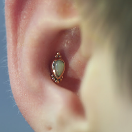 Explore airborne tattoo ideas, creative tattoo ideas in Charleston, available at MOLA Piercing and Fine Jewelry