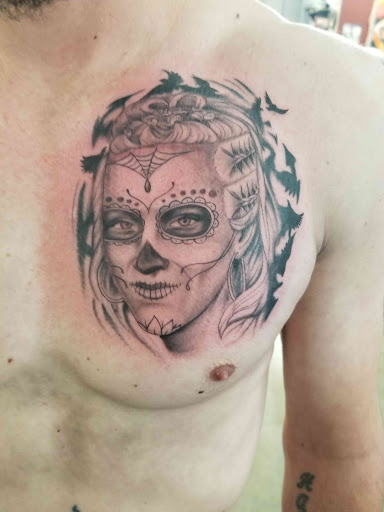 Explore hopeless romantic tattoo ideas, creative tattoo ideas in Bloomington, available at Crimson Breed Tattoo Studio