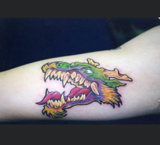 Explore snoopy tattoo ideas, creative tattoo ideas in Memphis, available at INKED MEMPHIS on Highland