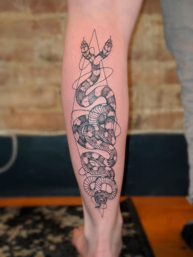 Explore full hand tattoo ideas, creative tattoo ideas in Rockland, available at Birds & Bones Tattoo Studio and Art Gallery