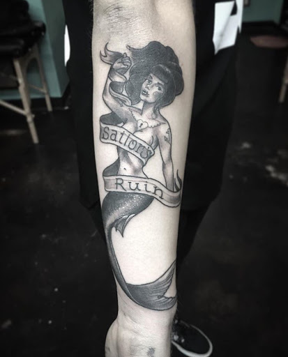 Explore feather memorial tattoo ideas, creative tattoo ideas in San Diego, available at Sideshow Tattoo and Piercing