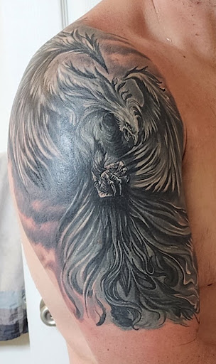 Explore hand tattoos ideas for men, creative tattoo ideas in North Brunswick, available at Orpheus Tattoo Studio