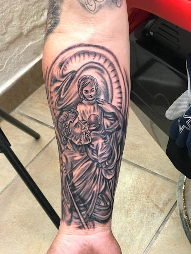 Explore hand tattoo cover up ideas, creative tattoo ideas in Baytown, available at Big Juniors Tattoos