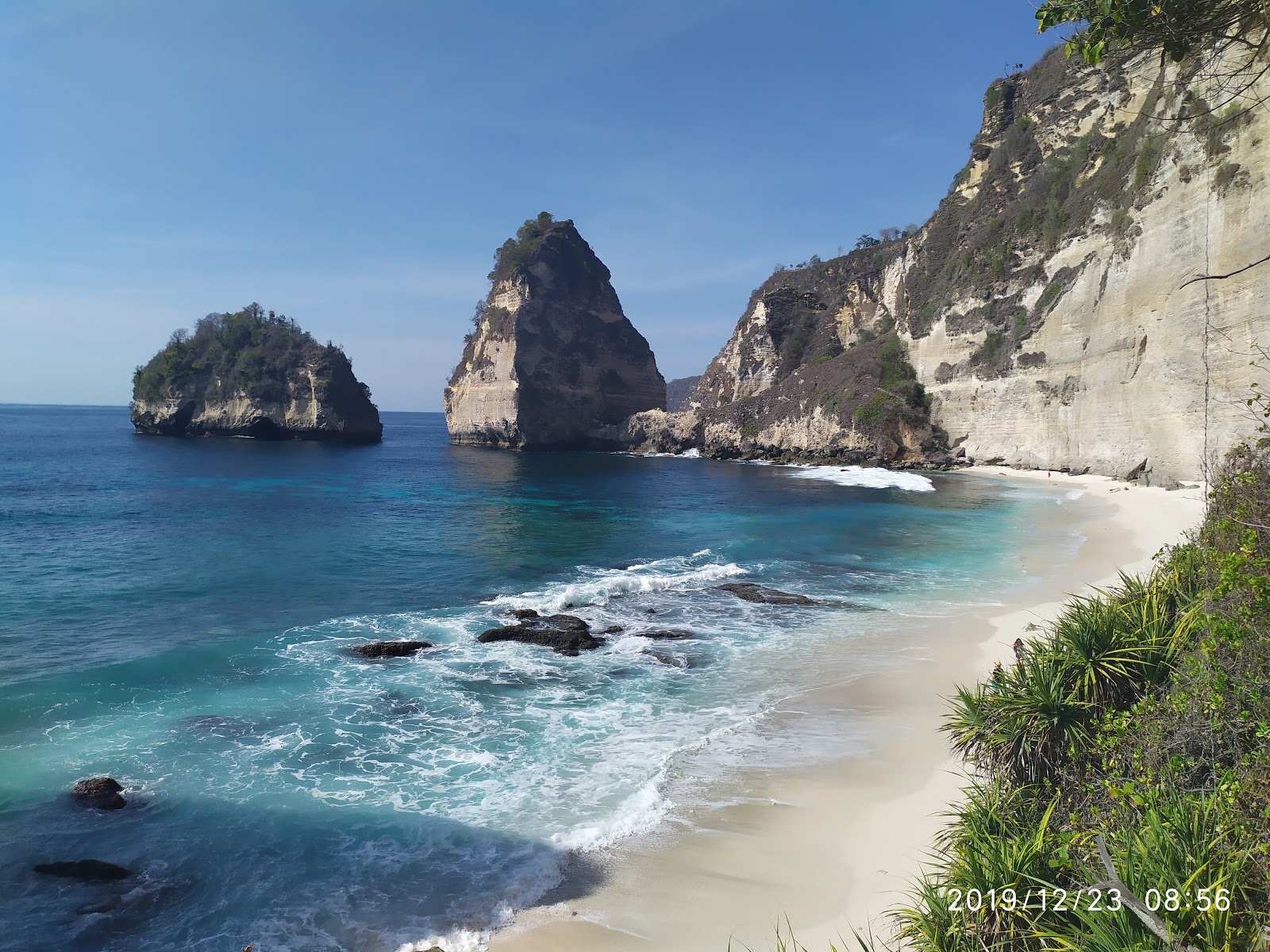Fotografie cu Pantai Pelilit cu o suprafață de nisip alb