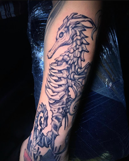 Explore snake tattoo ideas for females, creative tattoo ideas in San Antonio, available at Firme Copias Tattoo Studio