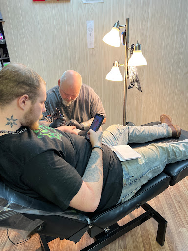 Explore cat tattoo idea, creative tattoo ideas in Anniston, available at Ink Therapy LLC Tattoo Studio