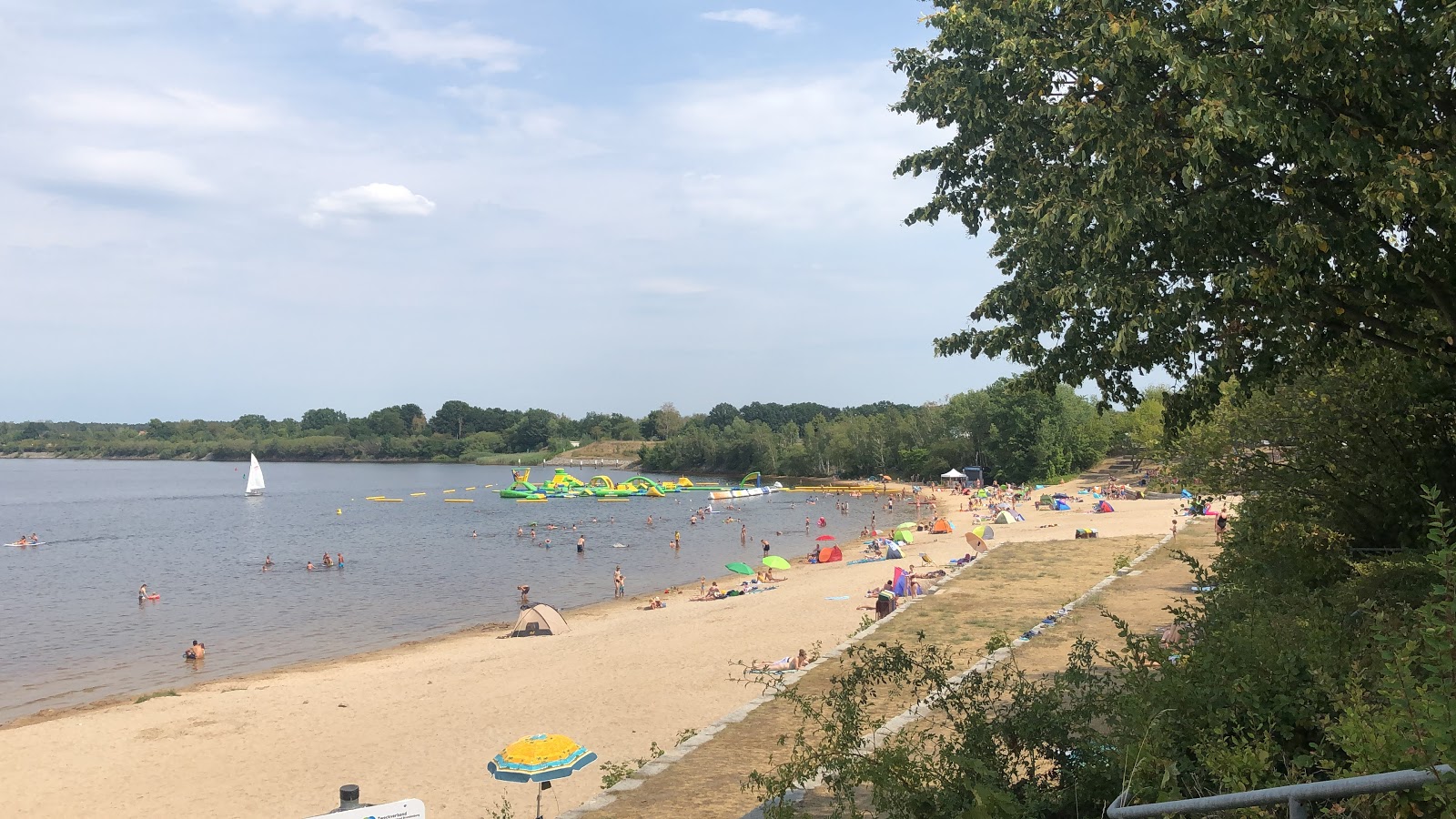 Foto de Playa de Grosskoschen con arena beige superficie